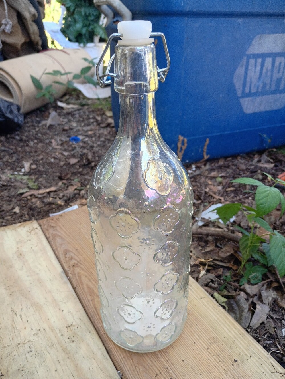 Glass Floral-Embossed Swing-Top Bottle - Clear